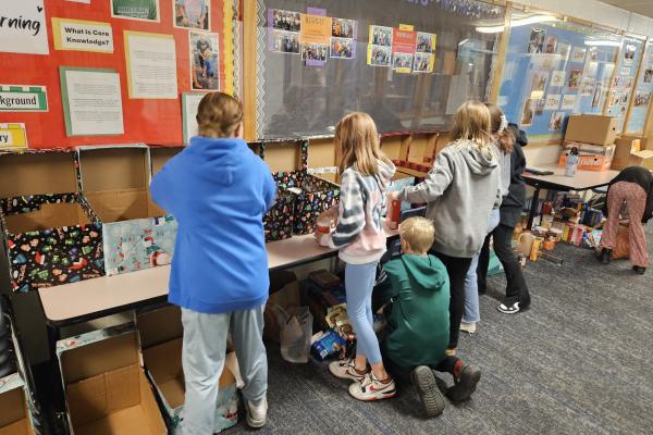 stuco packing boex for food drive