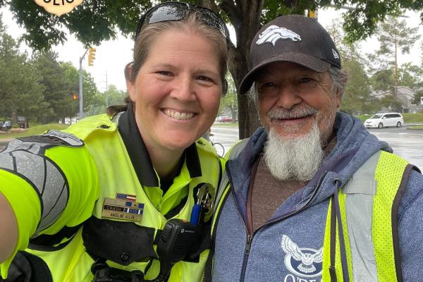 William "Grandpa" Dressler - O'Dea crossing guard with FCP community officer showing gratitude